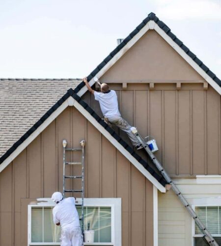 quality house painters working on a home exterior