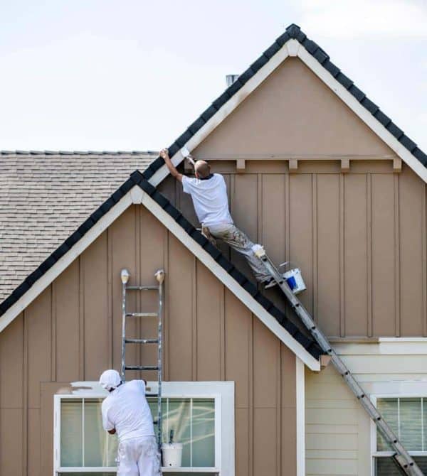 quality house painters working on a home exterior