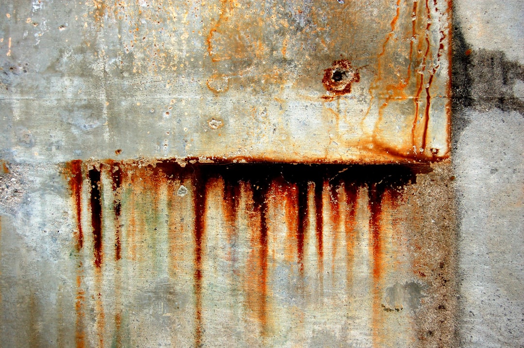rusty metal primer on heavily rusted iron gate