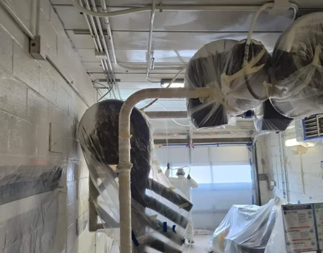 Industrial metal spray painting facility in Illinois