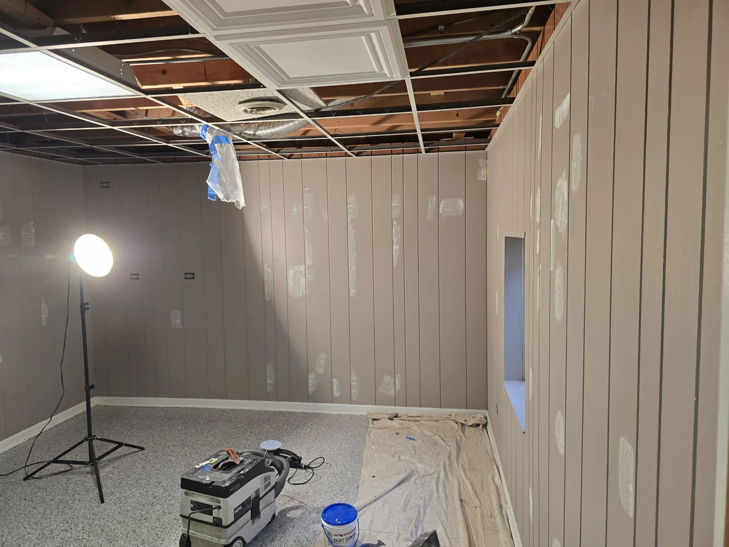 textured interior wall before and after painting