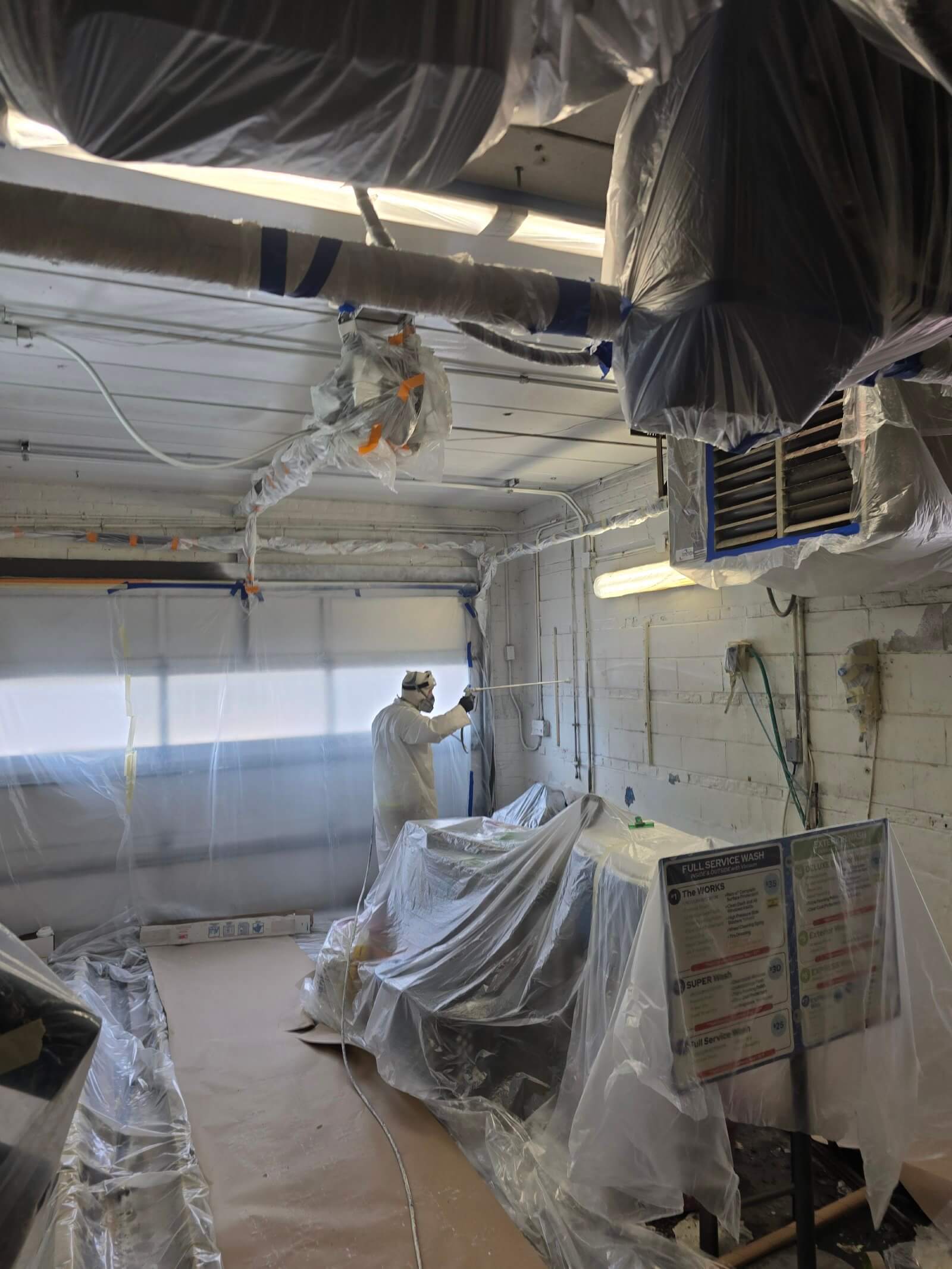 Cabinet spraying containment setup and tools